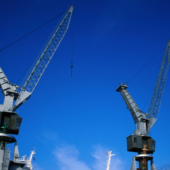 Cars being offloaded from a ship